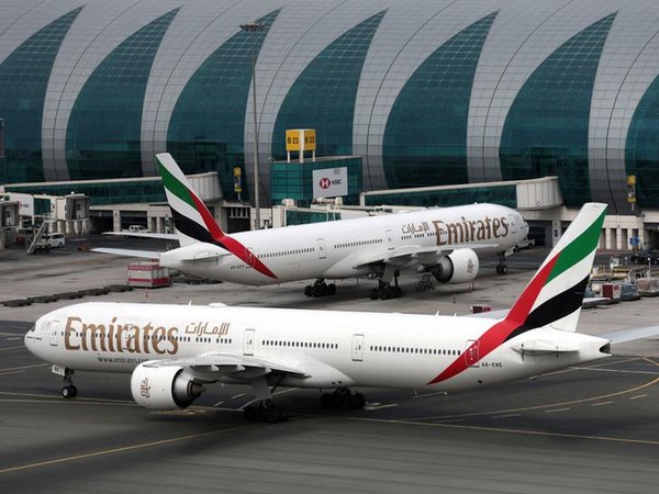 Emirates Airline planes at are seen Dubai International Airport in Dubai