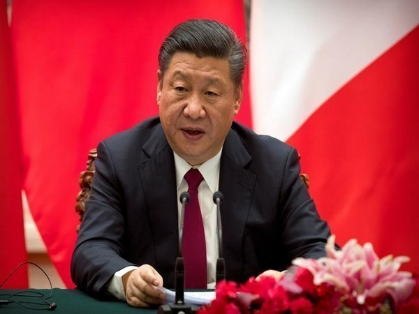 Chinese President Xi Jinping speaks during a joint press briefing with French President Emmanuel Macron, not shown, at the Great Hall of the People in Beijing