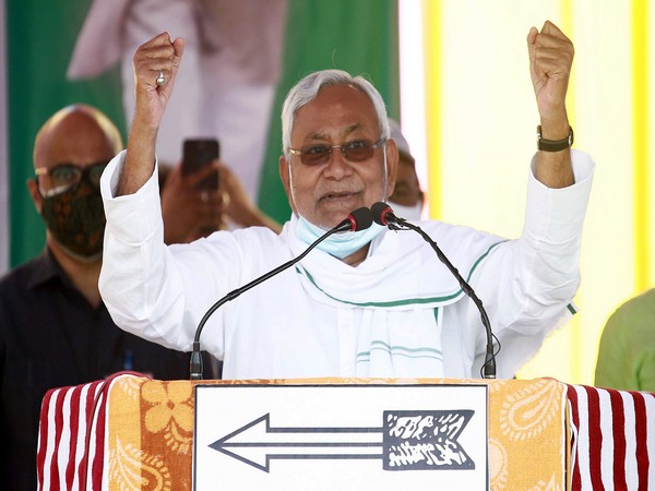 Chief Minister Nitish Kumar addresses the crowd during an election rally