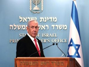 Israeli Prime Minister Benjamin Netanyahu delivers a speech at his Jerusalem office