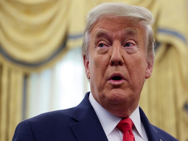 U.S. President Trump responds to a question from a reporter in the Oval Office at the White House in Washington