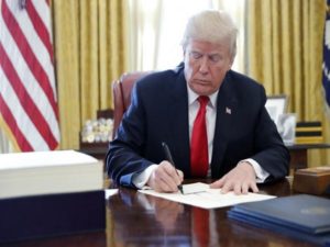 U.S. President Trump signs tax bill into law at the White House in Washington