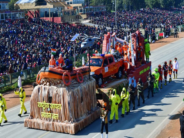 A tableau of NDRF, Ministry of Home Affairs passes through the Rajpath during the full dress rehearsal