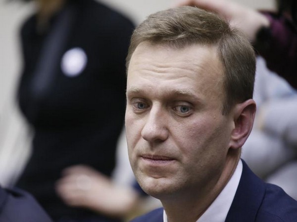 Russian opposition leader Alexei Navalny submits his documents to be registered as a presidential candidate at the Central Election Commission in Moscow