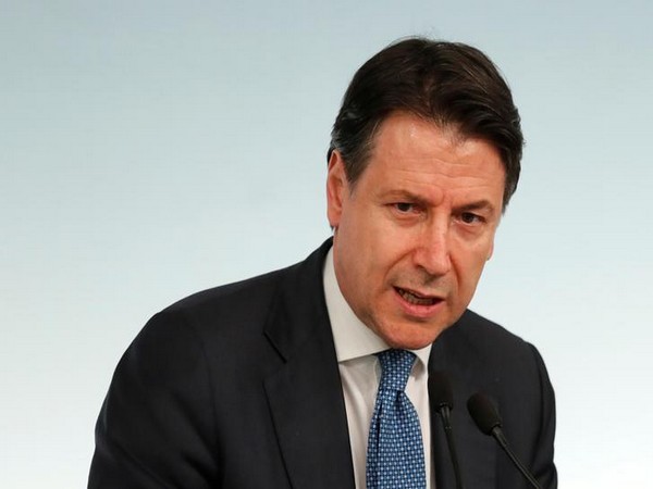 Italian Prime Minister Giuseppe Conte speaks to media as he announces a decree that will close cinemas, schools in order to contain the coronavirus, in Rome