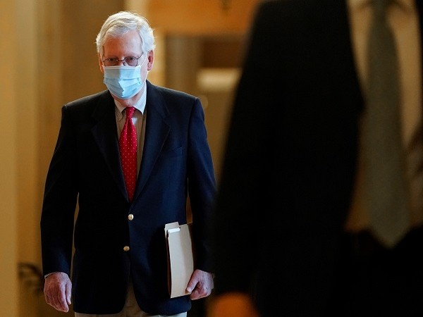 Senate Majority Leader Mitch McConnell (R-KY) walks to the Senate Chamber in Washington