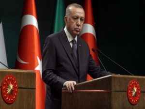 Turkish President Tayyip Erdogan attends a news conference in Ankara