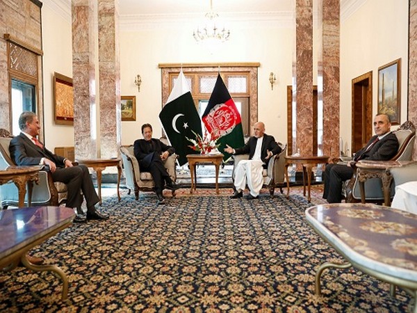 Afghan President Ashraf Ghani meets with Pakistan's Prime Minister Imran Khan at the presidential palace in Kabul