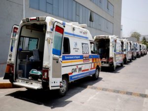 Ambulances carrying the COVID-19 patients are lined up outside a hospital