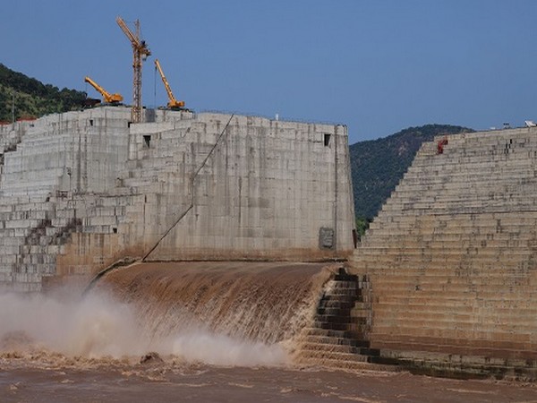 Water flows through Ethiopia's Grand Renaissance Dam as it undergoes construction work on the river Nile in Guba Woreda