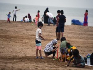 People enjoy Sunday evening at Girgaum Chowpatty