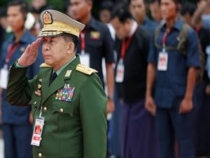 Myanmar's Commander in Chief Senior General Min Aung Hlaing salutes as he attends an event marking Martyrs' Day at Martyrs' Mausoleum in Yangon