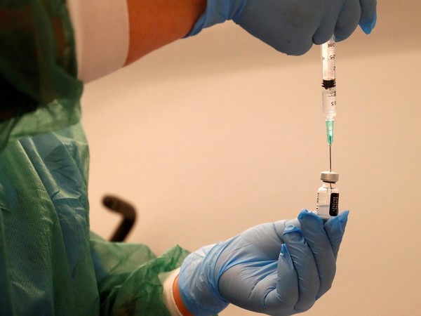 Medical worker prepares Pfizer/BioNTech COVID-19 vaccine at the hospital in Ventspils