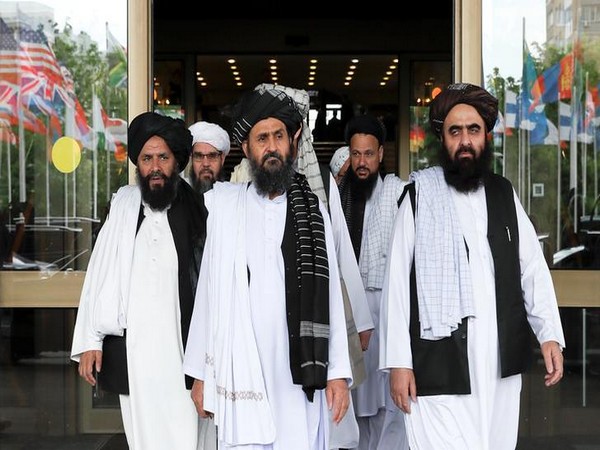 Members of a Taliban delegation leave after peace talks with Afghan senior politicians in Moscow