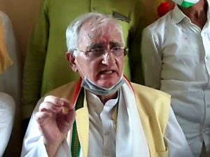 Congress leader Salman Khurshid speaks to the media