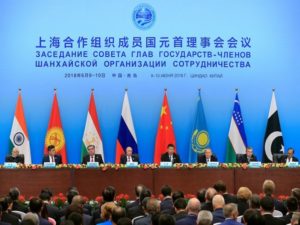 Heads of states attend a signing ceremony during Shanghai Cooperation Organization (SCO) summit in Qingdao