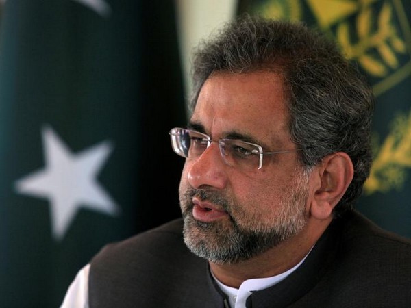 FILE PHOTO: Pakistan's Prime Minister Abbasi speaks with a Reuters correspondent during an interview at his office in Islamabad