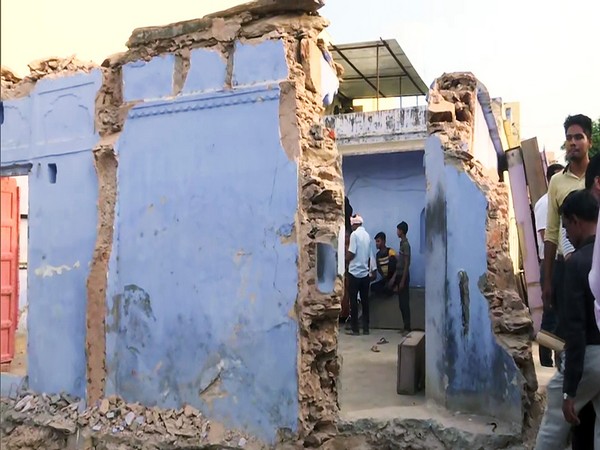 A temple was demolished using bulldozers at Sarai Mohalla