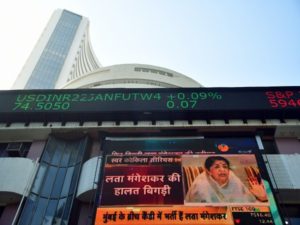 A screen displays news of Lata Mangeshkars health outside the BSE