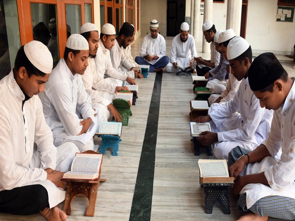 Young Muslim boys recite text from Holy Quran during the month of Ramadan at the Asom Markazul Ulum Madrassa at Islampur in Guwahati