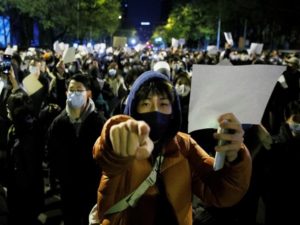 Vigil commemorating victims of a fire in Urumqi, in Beijing