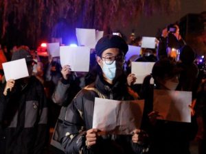 Vigil commemorating victims of a fire in Urumqi, in Beijing