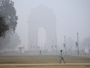 India Gate is engulfed with fog on a cold winter morning