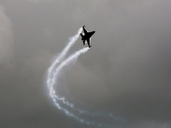 Pakistan Air Force fighter jet F-16 flies during an air show to celebrate the country's Independence Day in Karachi